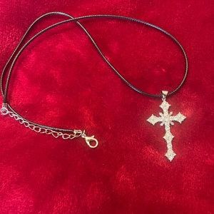 Silver Cross  (stamped 925) with crystals on 18” black cord type necklace